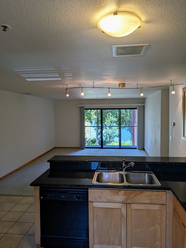 Front room/kitchen/patio - 920 NW Naito Pky Unit 920-J12