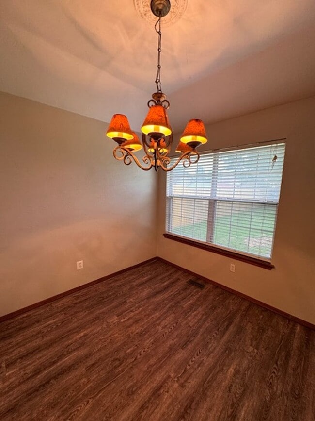Photo - Brand new Luxury vinyl Plank in living, Kitchen and dining, new paint, 3 bed 2 bath 2 car in Must...