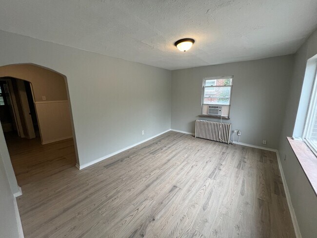 Photo - Spacious, Newly Updated 1-Bed Near UC & Downtown — Off-Street Parking, Radiant Heat Unit 3