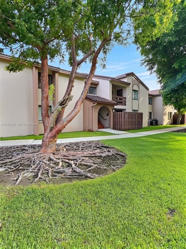 Building Photo - 8999 SW 123rd Ct Unit 210