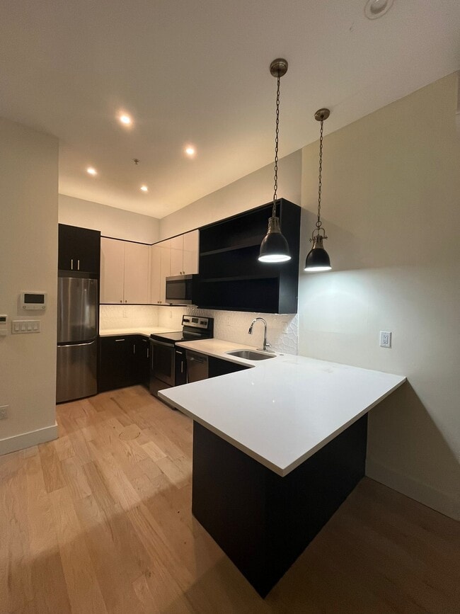 Building Photo - 610 Communipaw Ave Unit 2R