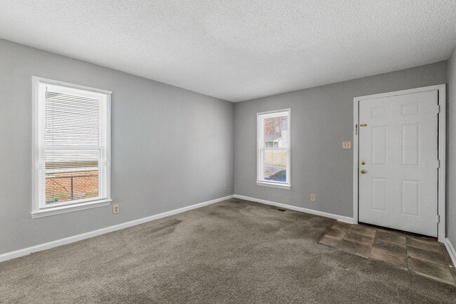 Photo - NE Home - Updated Kitchen and Bathrooms!  SS Appliances, Fire Place, Front Porch & Deck, Fenced Y...