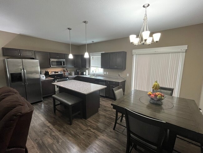Open Kitchen, granite countertops, stainless appliances - 7679 Hyde Ave S