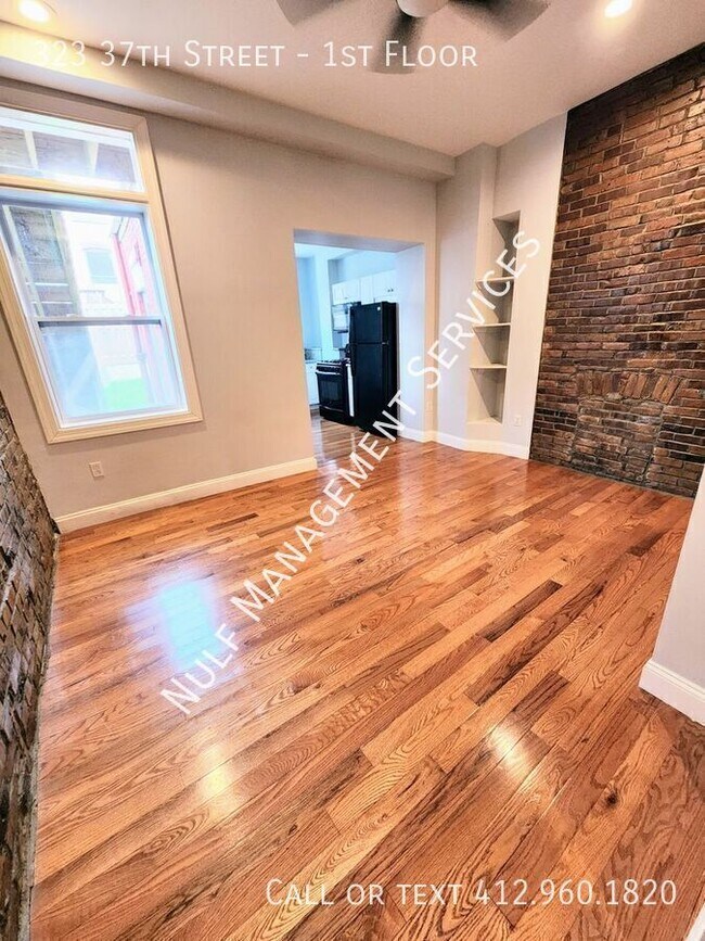 Photo - 323 37th St Unidad 1st Floor