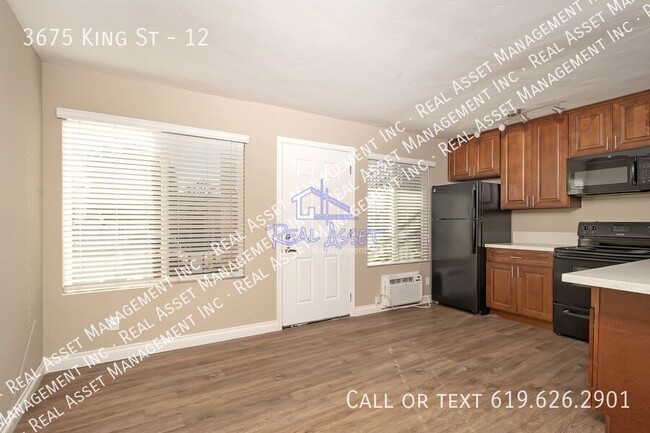 Building Photo - 3675 King St Unit 12