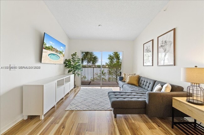 Building Photo - 5065 Wiles Rd Unit 308