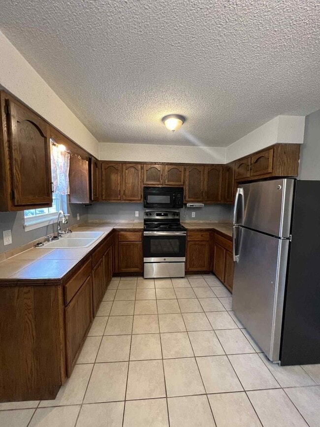 Photo - COMING SOON: CUTE 3 BEDROOM / 2 BATHROOM HOUSE IN CARTERVILLE MO!! FENCED IN YARD AND GARAGE!!
