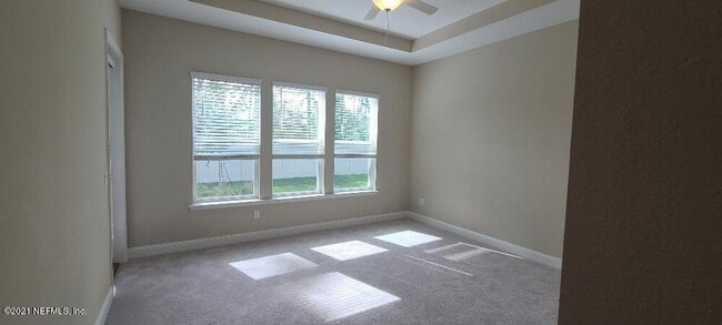 Photo - 4 bedroom home with 3 car garage In gated community