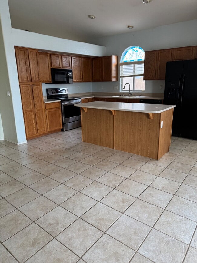 Photo - Open house Sunday 2-22-26 from 1-3pm! 3b/2b home with a pool backing Palm Valley golf course.