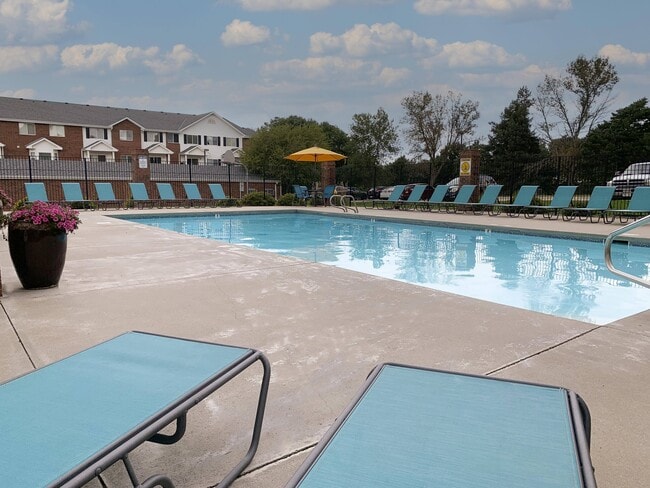 Soak up the sun or take a dipyour resort-style pool and sundeck make every day feel like a getaway. - Ridge Pointe Villas Rental