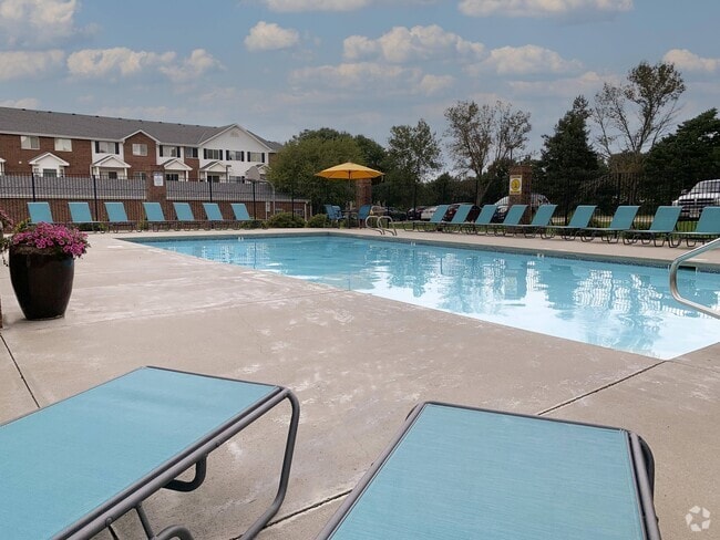 Soak up the sun or take a dipyour resort-style pool and sundeck make every day feel like a getaway. - Ridge Pointe Villas Rental