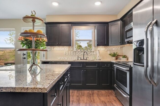 Photo - Elegance with Full Basement - North of the...
