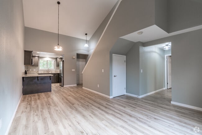 3BR, 2BA - 1,165SF - Living Room - Woodglen Terrace Apartments