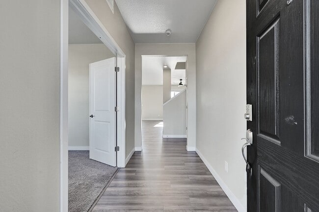 Photo - $3,340.95 - 5 Bed, 3 Bath Home in Thornton with Cozy Fireplace and Fenced-in Yard