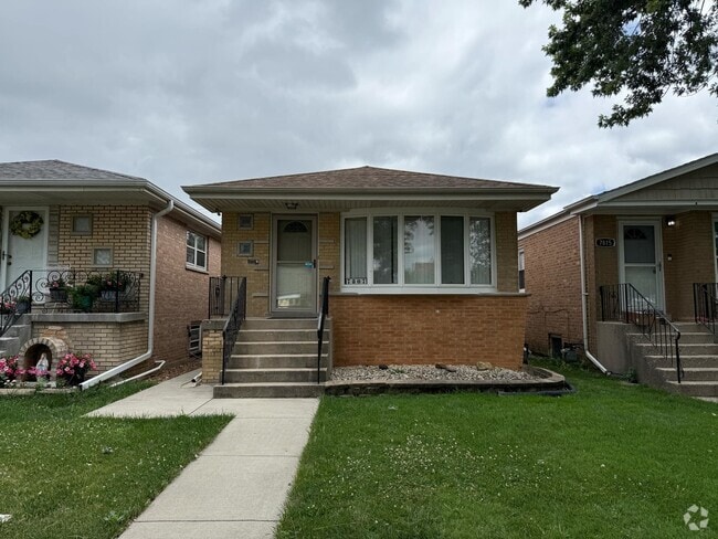 Building Photo - 7807 S Laramie Ave Rental