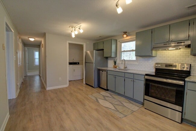 Photo - Available late August! Adorable + updated 3 bedroom home with fenced yard, 10 minutes from Downto...
