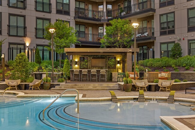 Resort-style Swimming Pool with Tanning Ledge, Cabanas and Sundeck