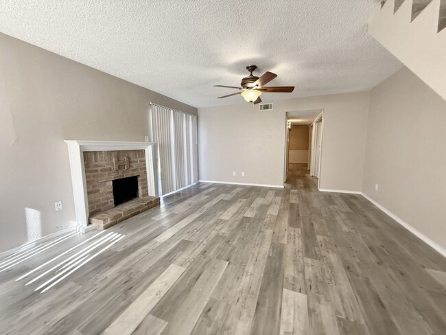 Photo - 3-Bedroom Duplex with Modern Flooring, Fireplace & Spacious Layout in Grand Prairie