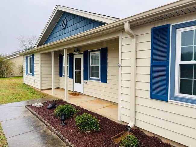 Building Photo - Coming soon with LARGE FENCED YARD, and lawn care INCLUDED