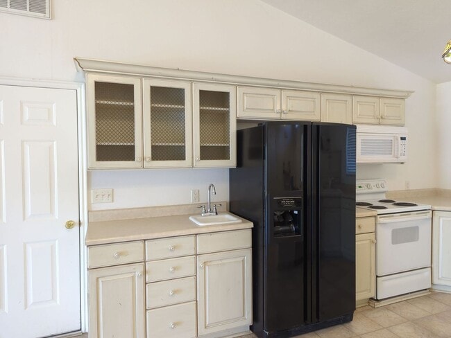 Photo - Charming 2-Bedroom + Office Home with Spacious Layout & Serene Backyard. Access to Community Pool...