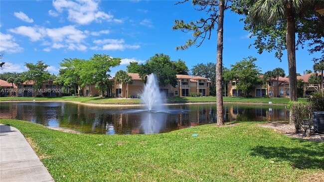 Building Photo - 4791 Via Palm Lakes Unit 1701