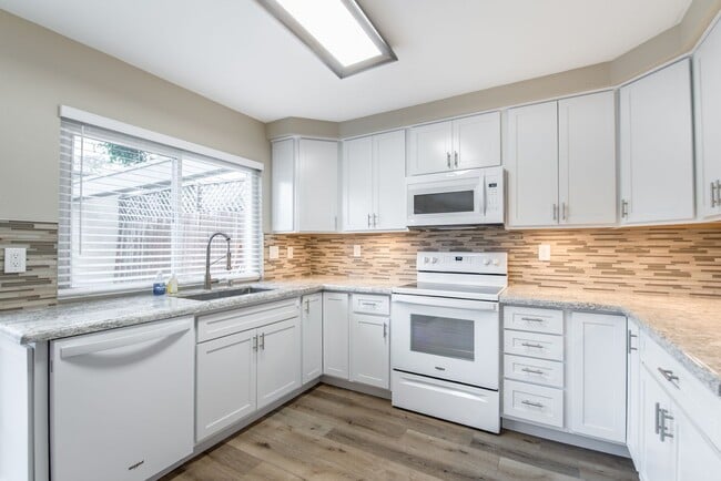 Photo - Welcome to this stunning 4-bedroom, 3-bathroom home in Tierrasanta