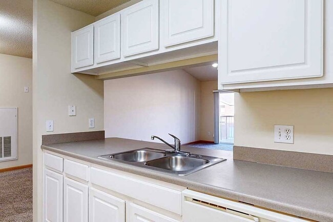 Our kitchens offer a functional design with ample cabinetry and counter space, making meal prep and organization effortless.