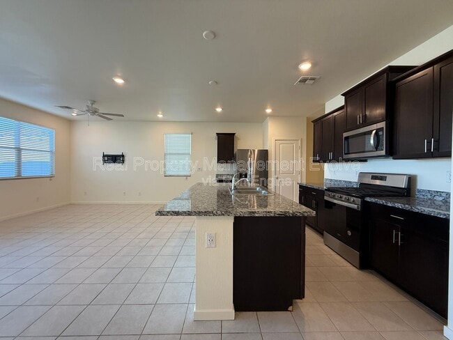 Building Photo - 12538 W Orangewood Ave