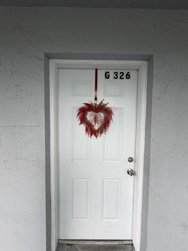 Building Photo - 6195 W 18th Ave Unit G326