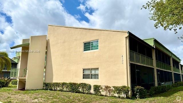 Building Photo - 4124 NW 88th Ave Unit 207 Rental
