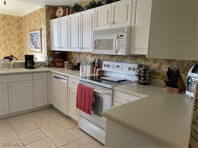 Building Photo - 3555 Laurel Greens Ln N Unit 103 Rental