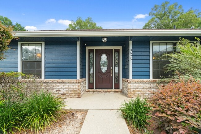 Photo - **Available February 2026***Welcome Home :: 3/2 with oversized fenced backyard in Indian Pines!