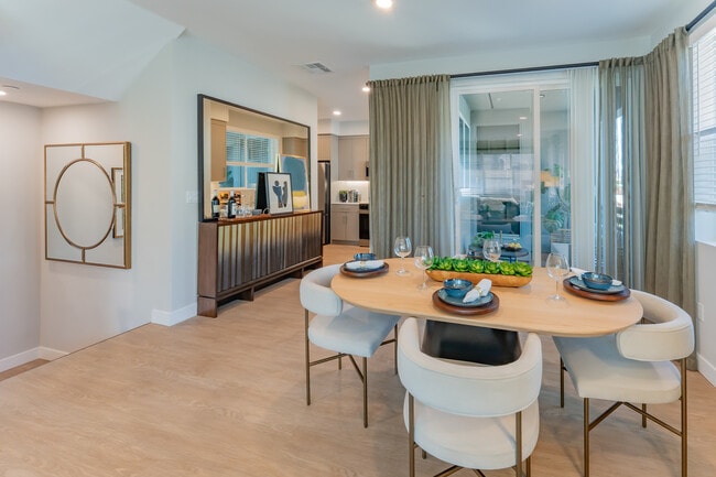 Dining Area Leading To Open Kitchen