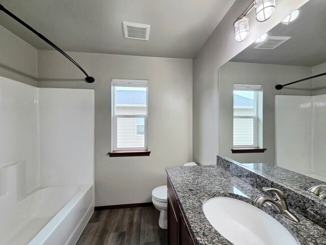 Photo - 3-Bed, 2.5-Bath Townhome w/ 2-Car Garage