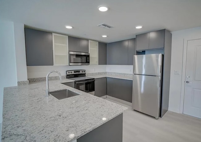 Photo - Top Floor Corner Unit – Brand New 3/2 Condo with Balcony in Millenia Park *** Only $1995/mo ***