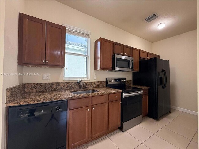 Building Photo - 17067 SW 93rd St Unit Studio Rental