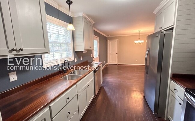 Photo - Limited Time Special Offer / Cozy 3 bed 2 bath Home Fenced Yard, Deck, Spacious Garage / Availabl...