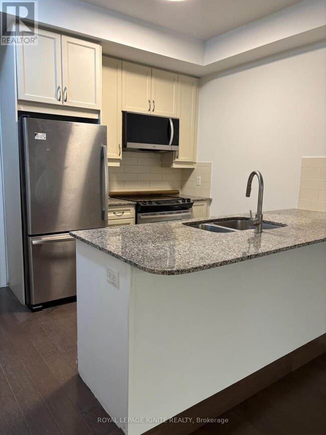 Photo - 701 Sheppard Ave W Unité 119