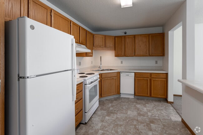 2BR, 1.5BA - 1,119SF - Kitchen - Silver Lake Pointe 55+