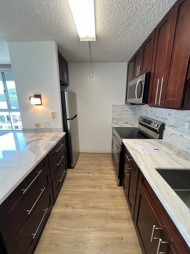 Photo - A/C. Two Parking Stalls. Swimming Pool. Pet Friendly. (RRLLC) Unit 401