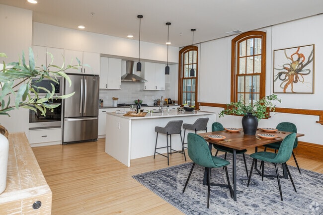 3BR, 2BA - 1,728SF - Dining Room - Caroline Heights Apartments