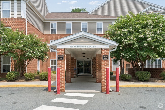 Entrance - Woods Edge Apartments - 55 and Better!
