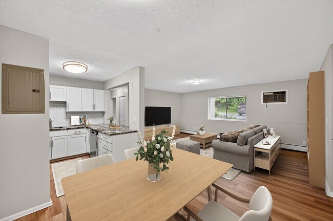 Inviting and modern, Park Village West features beautifully designed living spaces that blend comfort with style. The open layout showcases a spacious kitchen and cozy living area, perfect for gatherings. Explore your new home today!