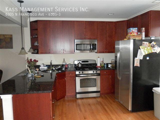 Building Photo - 6305 N Francisco Ave Unit 6305-3