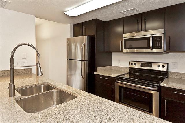 Building Photo - 5909 Birchbrook Dr Unit 209