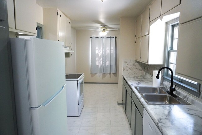 Photo - 3 bed 2 ba w Finished Basement + Garage - APPLY FREE!