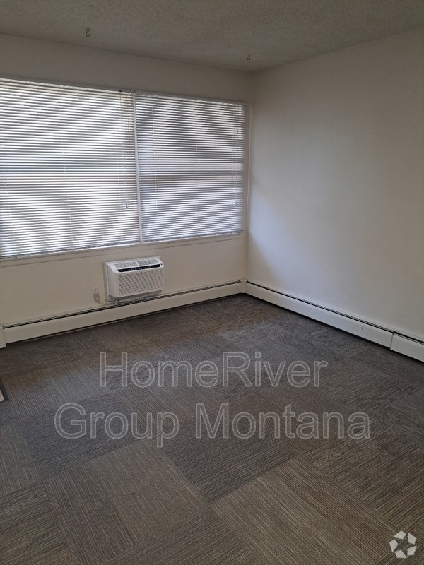 Building Photo - 707 SW Higgins Ave Rental