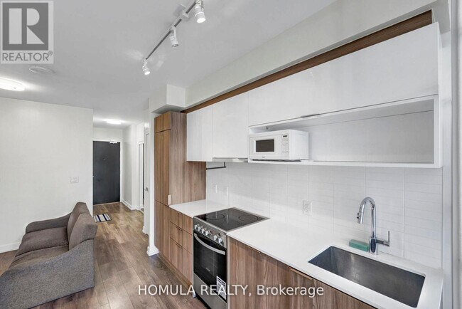 Photo - 159 Wellesley St E Unit 303