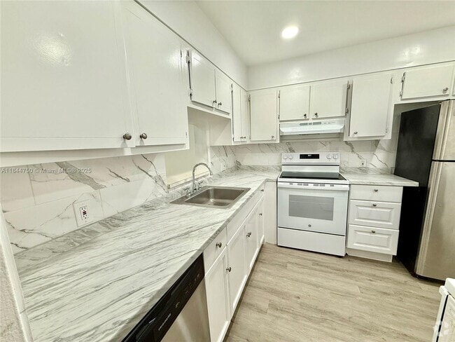 Building Photo - 11925 NE 2nd Ave Unit B207 Rental