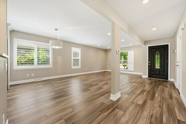 Photo - Spacious 4BR Home with Finished Basement, Private Yard & Community Amenities